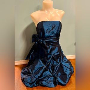 Gently worn cute short blue taffeta dress, perfect for a night out or party!